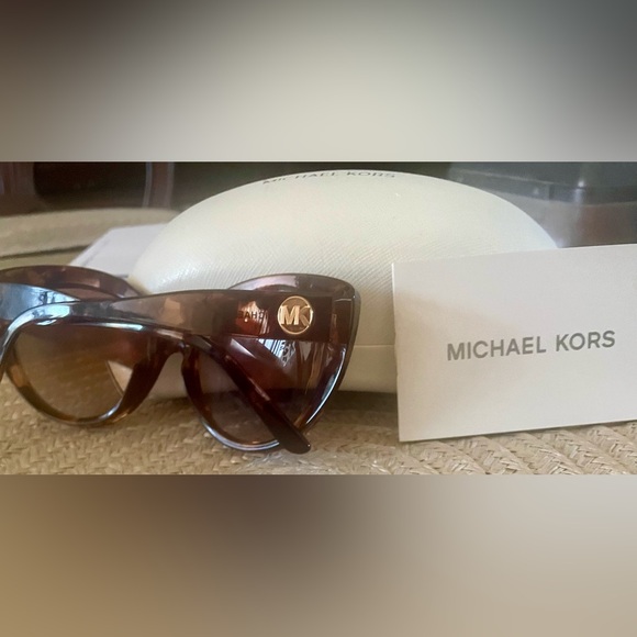 Micheal Kors Sun glasses brown color never worn